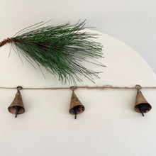 Load image into Gallery viewer, Rustic tin cone shaped brass bell jute holiday garland
